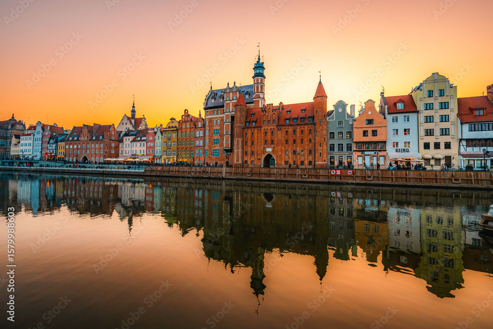 Obraz premium Gdansk with Motlawa river in Poland. Old town colourful house with Holy Spirit Gate