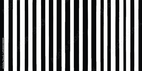 Vertical black and white striped pattern creating a modern abstract design. 