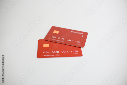 credit card, modern payment tool, transaction tool, two red credit cards isolated on a white background.