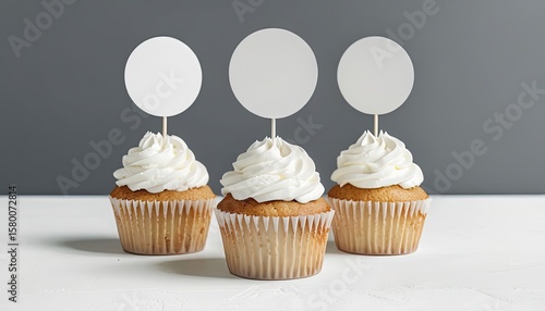 Three cupcakes with blank circle toppers for mockup