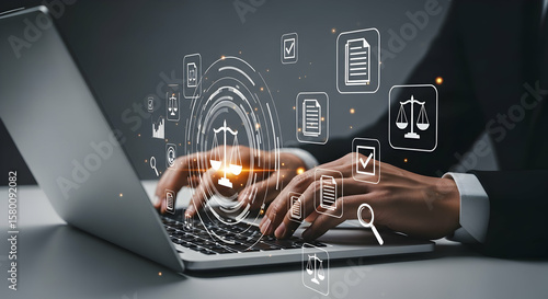 Document and compliance. Management and assessment system of compliance. Lawyer reviewing and preparing legal documents. Hands typing on laptop computer keyboard at desk in office. 