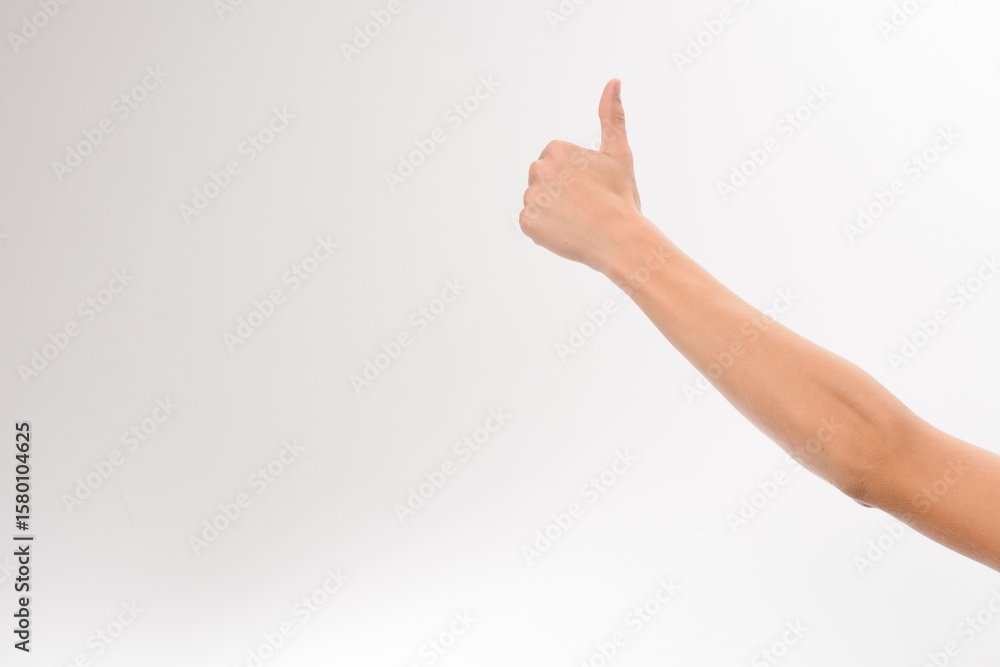 Thumbs up. Positive gesture against a clean white background. Perfect for expressing approval, success, or encouragement. Thumbs up. Positive gesture against a clean white background. Perfect for expressing approval, success, or encouragement.
