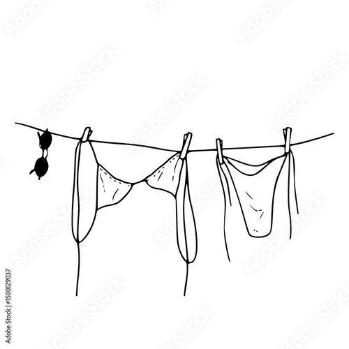 swimwear hanging on a clothesline