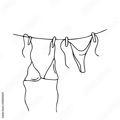 swimwear hanging on a clothesline