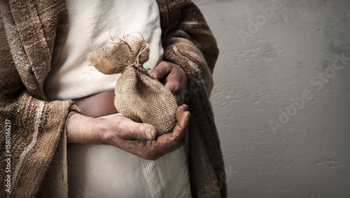 Картината върху платно Male hands holding a bag