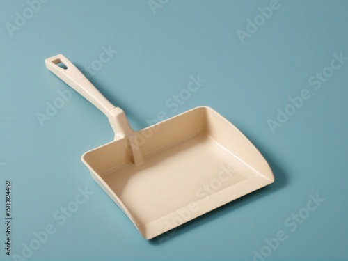  A cheerful dustpan ready to tackle household messes