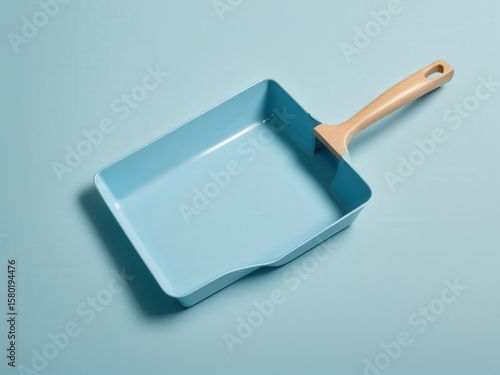  A cheerful dustpan ready to tackle household messes
