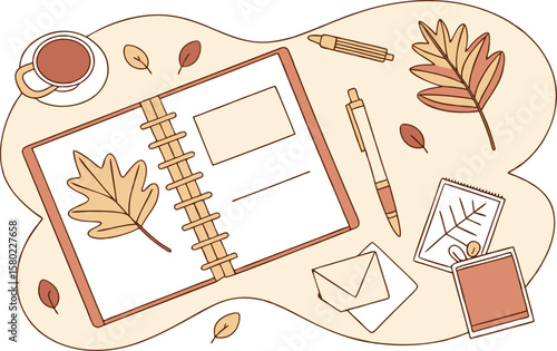 Autumn themed desk with open notebook, pens, envelope, leaves, and coffee cup in a cozy workspace setup