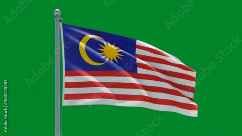 Malaysian Flag: The national flag of Malaysia, a symbol of unity and pride, waves proudly against a backdrop of a vibrant green screen, with each stripe and emblem conveying its unique story.