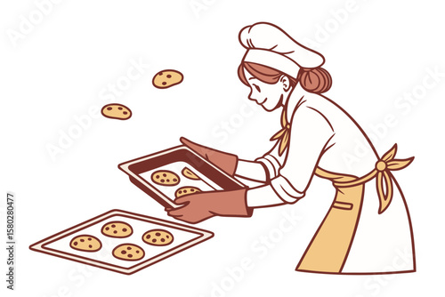 Joyful baker wearing chef hat and apron carefully places freshly baked chocolate chip cookies onto a cooling rack with a smile