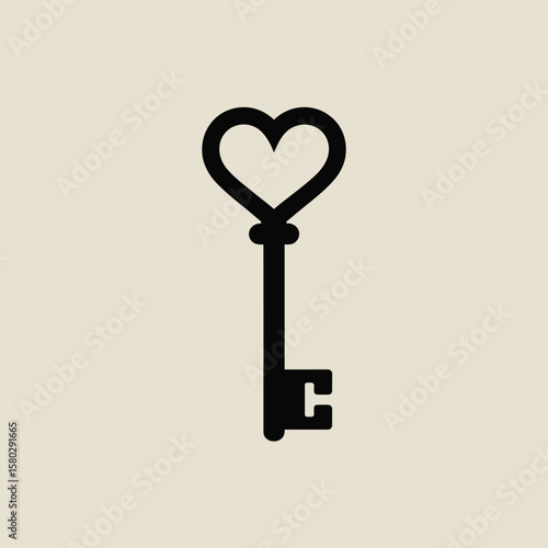 Black silhouette of a vintage key with a heart shaped bow on a light beige background