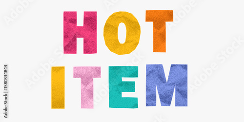 Bold phrase hot item from hand cut paper alphabet pieces. Multicolor crumpled texture, jagged torn outlines, messy ransom collage layout with cartoon charm.