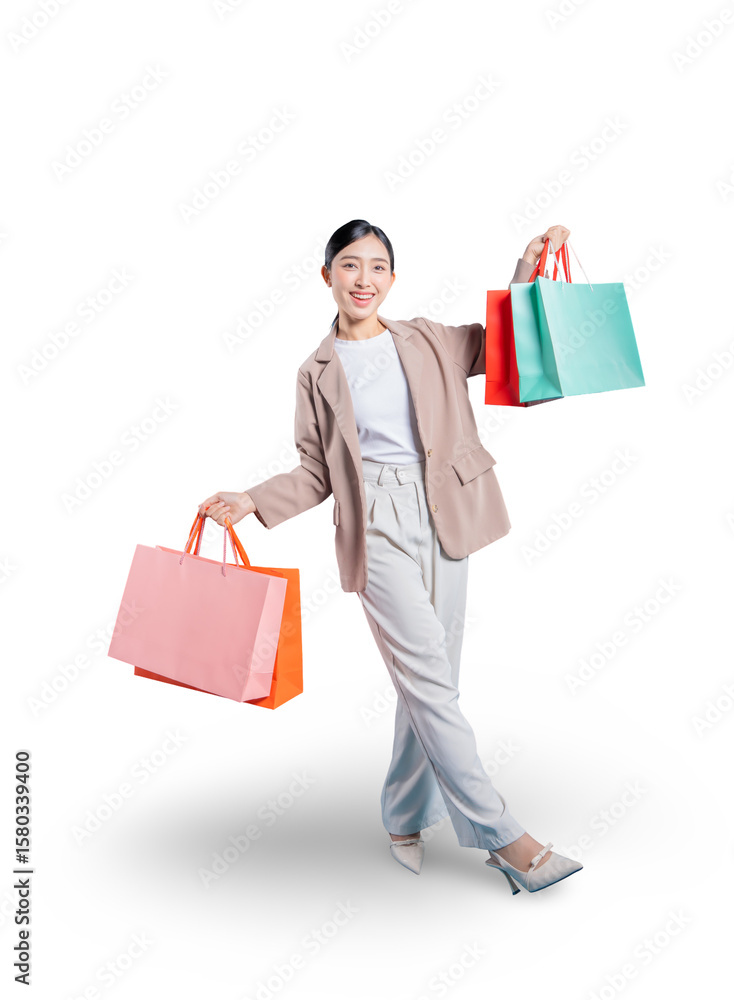 young Asian woman is captured in a dynamic walking pose, holding her shopping bags out with a bright smile, full of energy and joy on a png background.
young Asian woman is captured in a dynamic walking pose, holding her shopping bags out with a bright smile, full of energy and joy on a png background.
