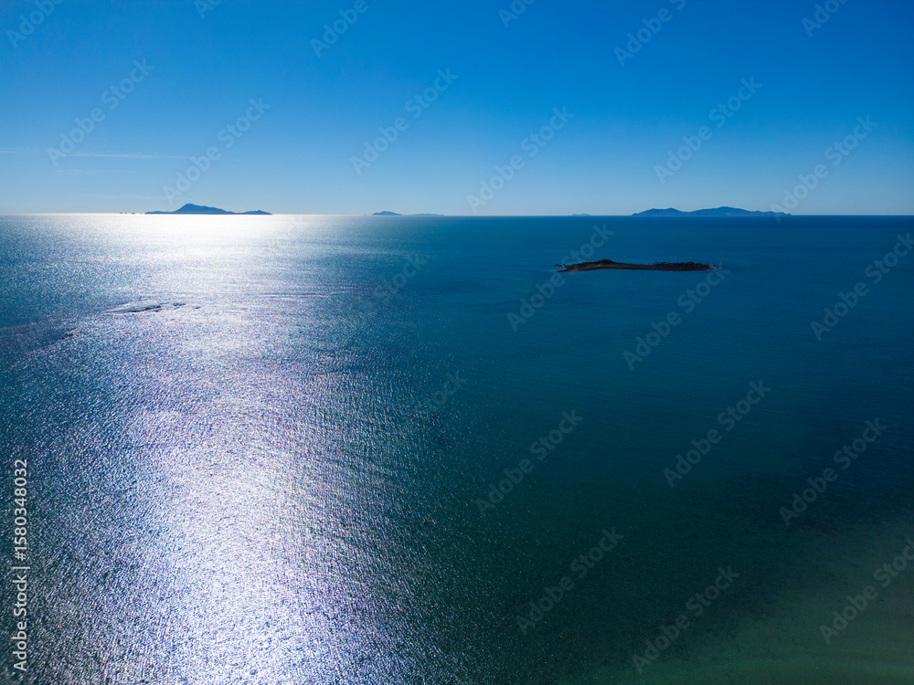 Fototapeta premium Aerial Drone View of Tropical Queensland Beach, Ocean Waves, Island Coastline and Shoreline – Scenic Coastal Landscape, Clear Blue Water, Australia Nature, Travel, Tourism, QLD