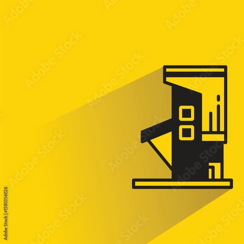 apartment building icon with shadow on yellow background