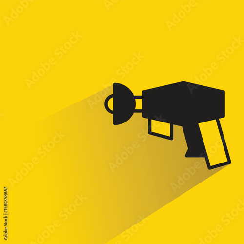 space gun icon with shadow yellow background