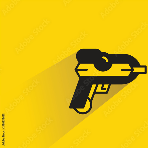 space gun icon with shadow yellow background
