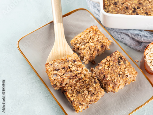 Baked oatmeal peanut butter banana cake bars with chocolate chips