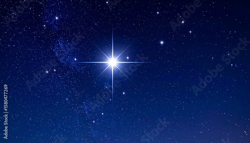 A brilliant star shines brightly in a night sky filled with countless stars