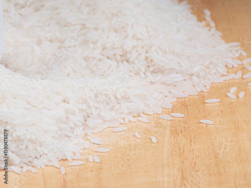 Raw White Jasmine Rice on Wooden Surface