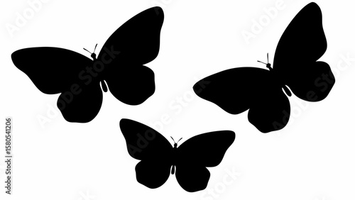 Three butterfly silhouettes with varied wing positions displayed in a monochrome composition on white background