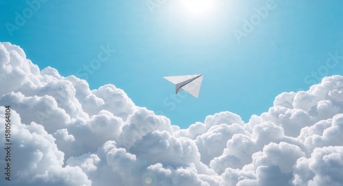 A paper airplane flying high in the sky above fluffy white clouds on a bright sunny day adventure