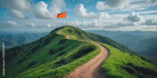 Challenging narrow mountain trail path leading to hilltop orange flag on summit, blue sky, achievement, success journey, motivation, perseverance, outdoor adventure, challenge, Motivation Monday