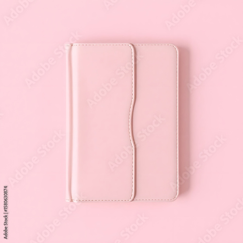 pink notebook isolated on white background