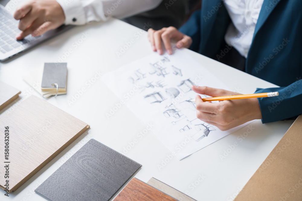 Interior designers brainstorming creative design ideas for modern home in collaborative meetingใ Interior designers brainstorming creative design ideas for modern home in collaborative meetingใ