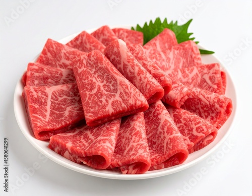 wagyu meat on a plate with white background.