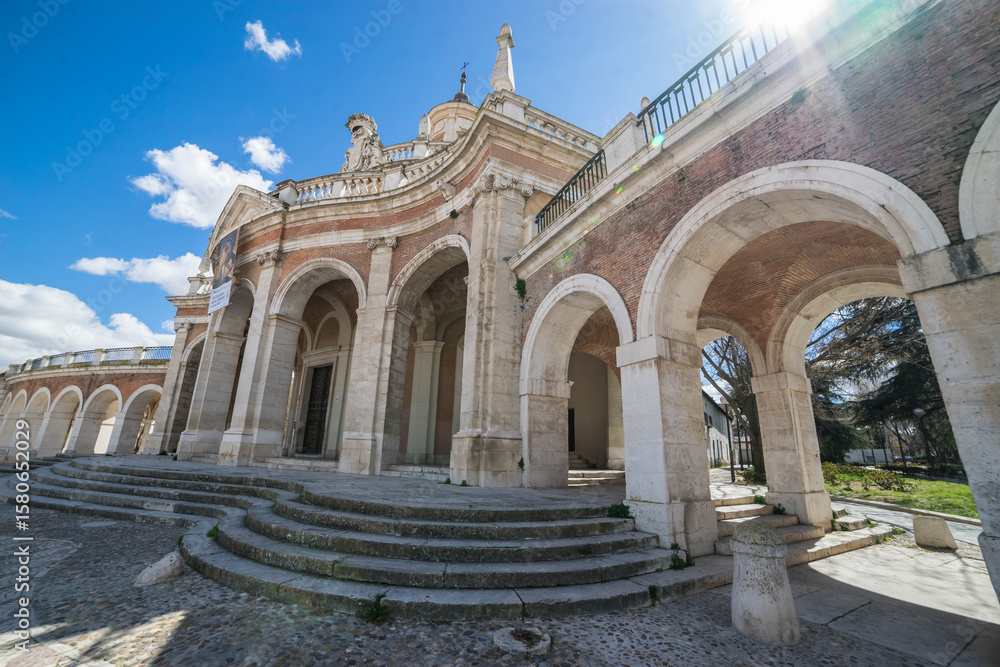 Obraz premium Explore stone arches and walkways at the Church of San Antonio in Aranjuez, Madrid, Spain, linked to the Palace of Aranjuez