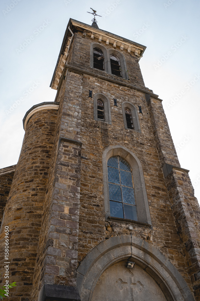 Fototapeta premium Outside of an old abandoned church somewhere in Belgium.