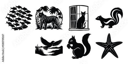 A collection of black silhouette animals and sea life isolated on white