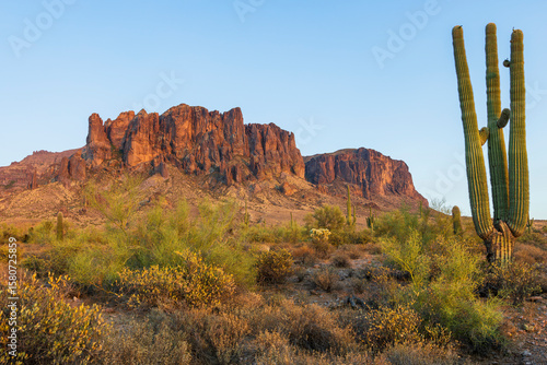 Sunlit Superstition Mountains and Saguaro Cacti in Arizona Desert