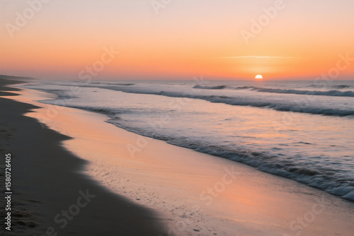 Wallpaper Mural Sunrise over the ocean reflecting on wet sand early morning seascape Torontodigital.ca