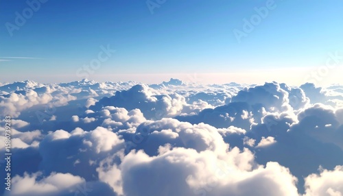 High-altitude view of fluffy clouds against a vibrant blue sky