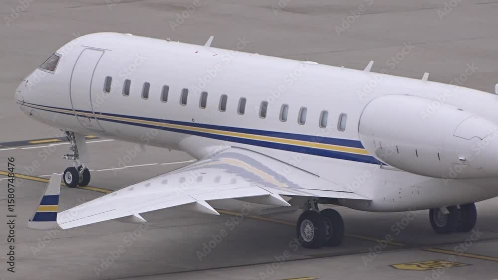 corporate jet parked airport tarmac scene private luxury travel rich vip panning shot zurich highlight flyer aviation serene perspective 