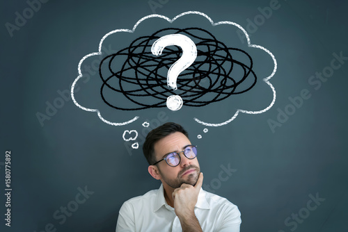 Man with glasses thinking with tangled thought bubble and question mark contemplation