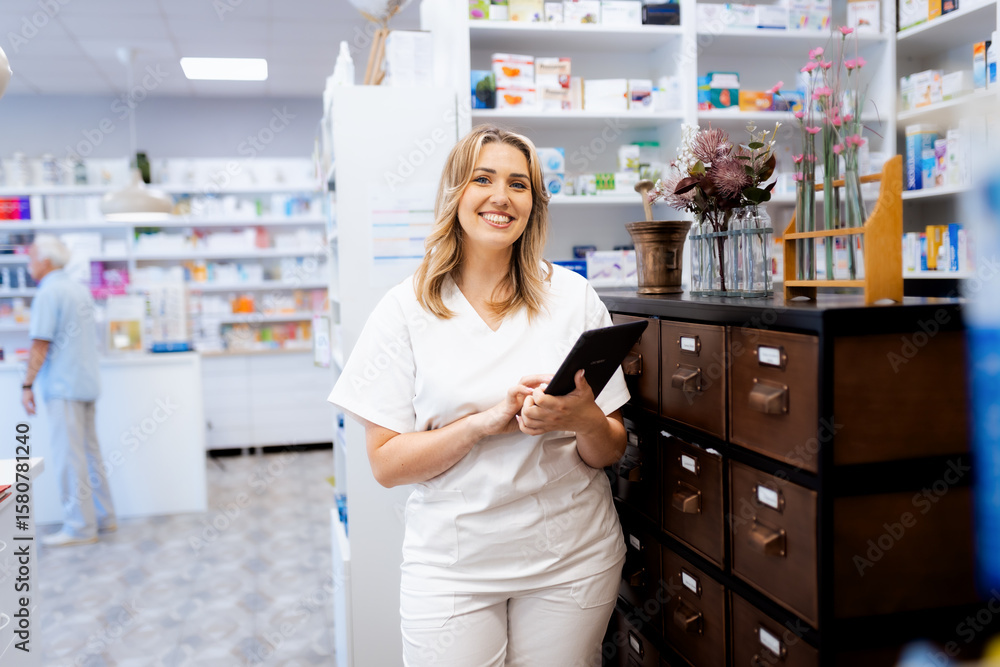 Portrait of female pharmacist in drugstore. Portrait of female pharmacist in drugstore.