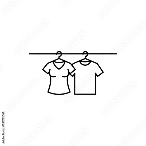 Two t shirts hanging on a clothes hanger on a rail