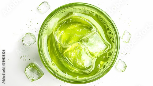 Cold matcha green tea with ice cubes in glass