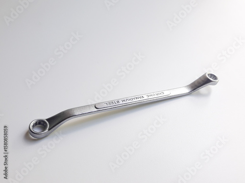 Ring wrench or also known as offset ring wrench and box-end wrench, isolated on white background.