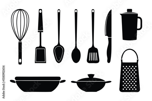 Culinary Tools: A curated collection of essential culinary tools, from whisks to graters, meticulously arranged to showcase the tools of the trade.