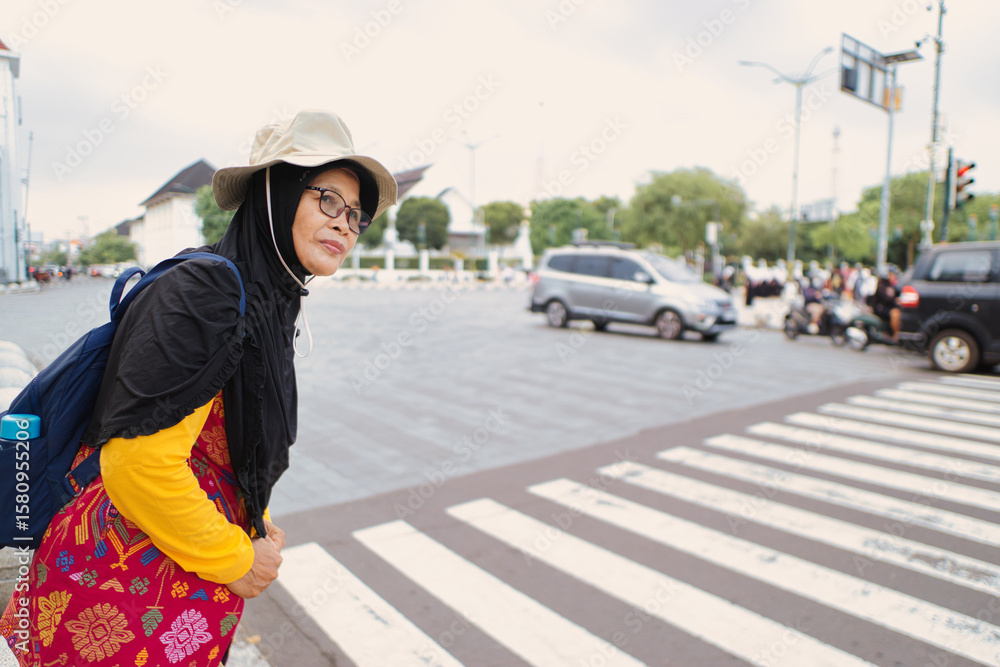 Woman Wearing Casual Clothes Standing at Busy Urban Crosswalk in the City Woman Wearing Casual Clothes Standing at Busy Urban Crosswalk in the City