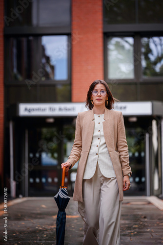 Businesswoman Leaving Job Center with Determined Expression