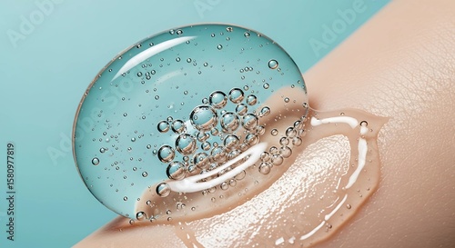 Close-up of a clear gel with bubbles on a person's skin, showing texture.