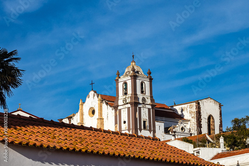 View of modern and historic buildings in the center of Silves, Algarve region, Portugal.