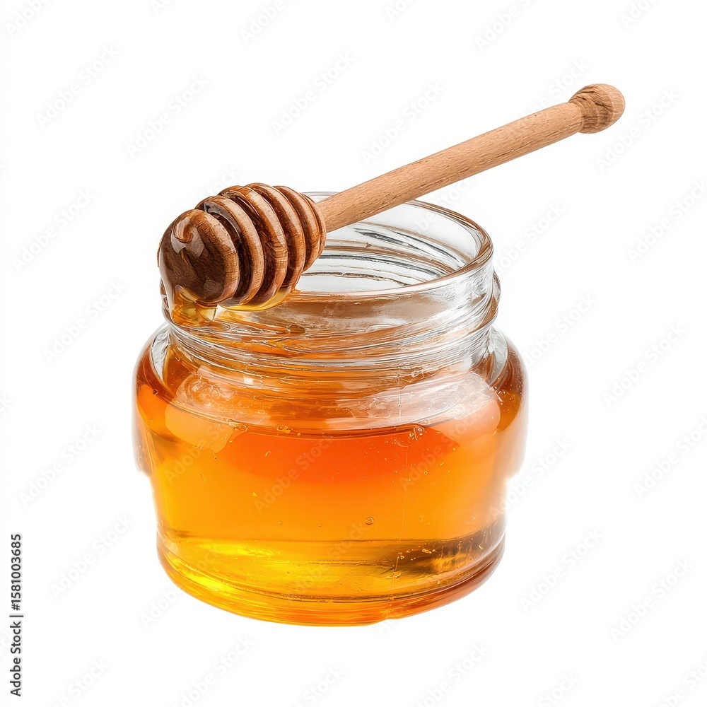 A jar of honey with a wooden spoon A jar of honey with a wooden spoon