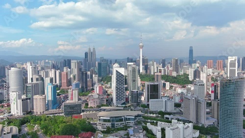 Kuala Lumpur, Malaysia: Aerial view of capital city of Malaysia, modern skyline on sunny day, perfect for travel, business, or development projects - landscape panorama of Southeast Asia from above
