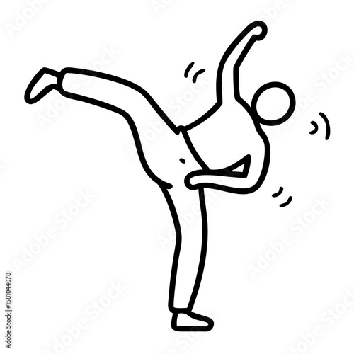 Male capoeira dancer performing spinning kick in dynamic pose  